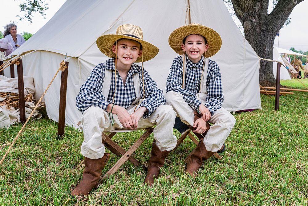 Boys at the civilian contingent in the Texan camp at the annual Battle of San Jacinto Festival and Battle Reenactment.…