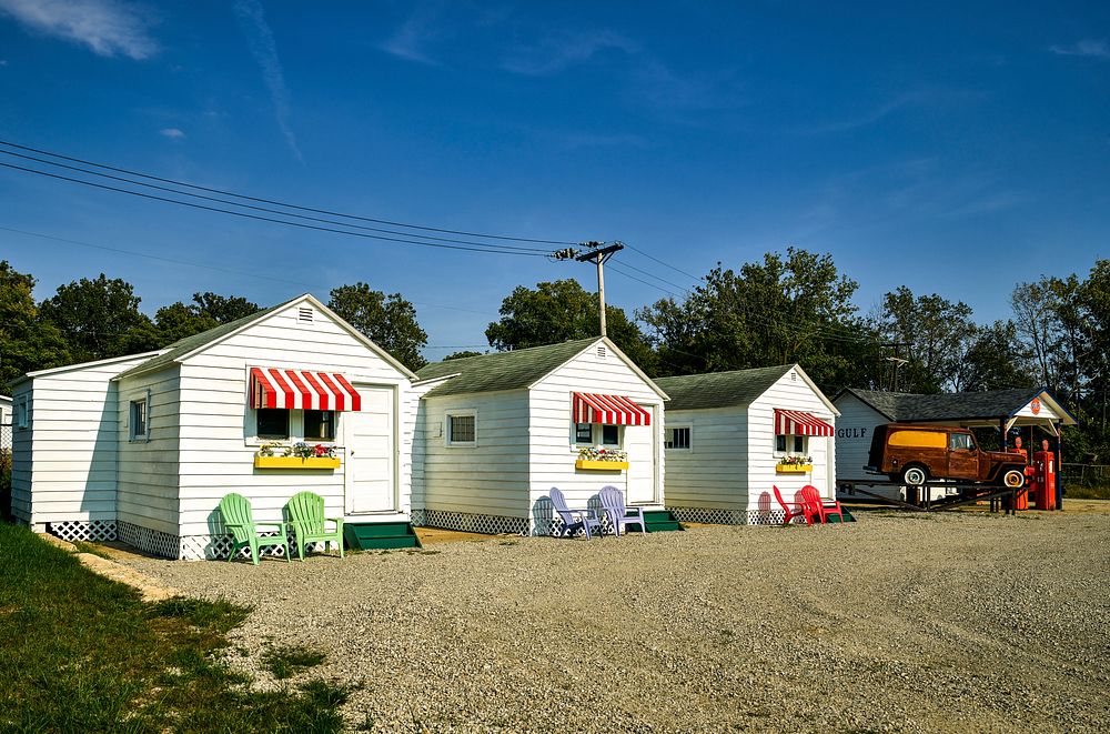 Tourist cabin displays outside the National Automobile and Truck Museum in Auburn, Indiana. Original image from Carol M.…