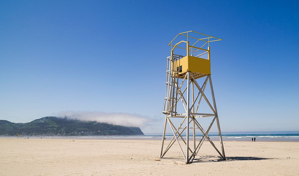 Lifeguard tower and a low, passing cloud on the beach of the small, Pacific Ocean town of Seaside, Oregon. Original image…