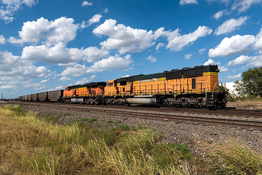 Freight train approaches in an industrial neighborhood of Fort Worth, Texas. Original image from Carol M. Highsmith&rsquo;s…