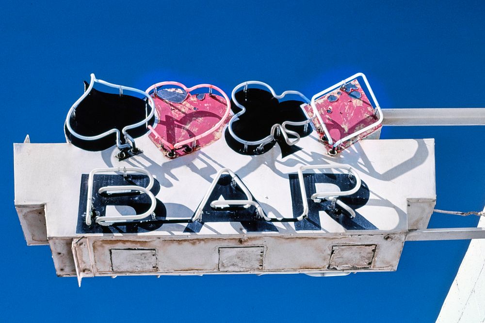 Four Aces Bar sign, Mullan Road, Superior, Montana (1987) photography in high resolution by John Margolies. Original from…