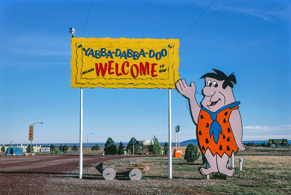 Welcome sign, Flintstone's Bedrock City, Rts. 64 and 180, Valle, Arizona (1987) photography in high resolution by John…