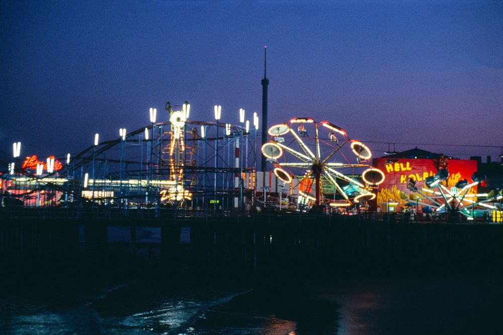 Steeplechase Pier night, Atlantic City, New Jersey (1978) photography in high resolution by John Margolies. Original from…