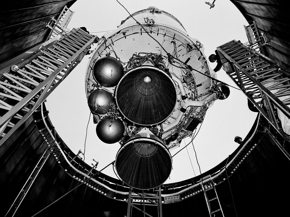 A Centaur second-stage rocket is lowered into the vacuum tank inside the Space Power Chambers at NASA&rsquo;s Lewis Research…