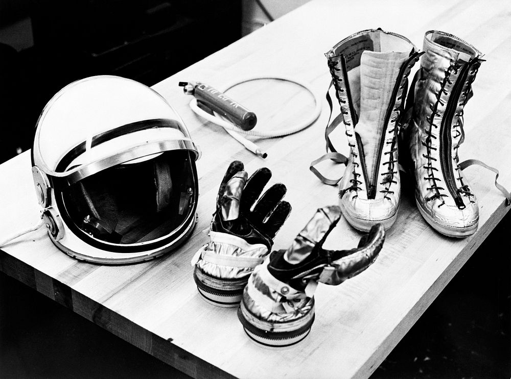 Table top view of some of the Mercury suit components including gloves, boots and helmet. May 1st, 1961. Original from NASA…