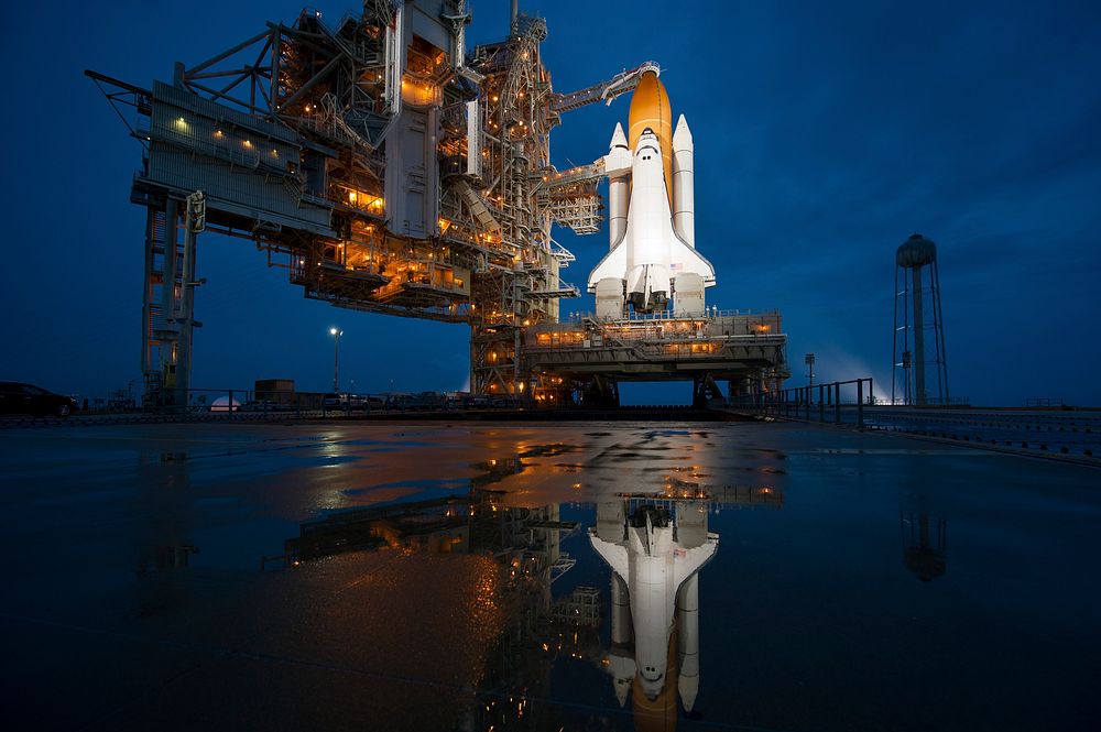 Atlantis is seen shortly after the rotating service structure was rolled back at launch pad 39a at the NASA Kennedy Space…