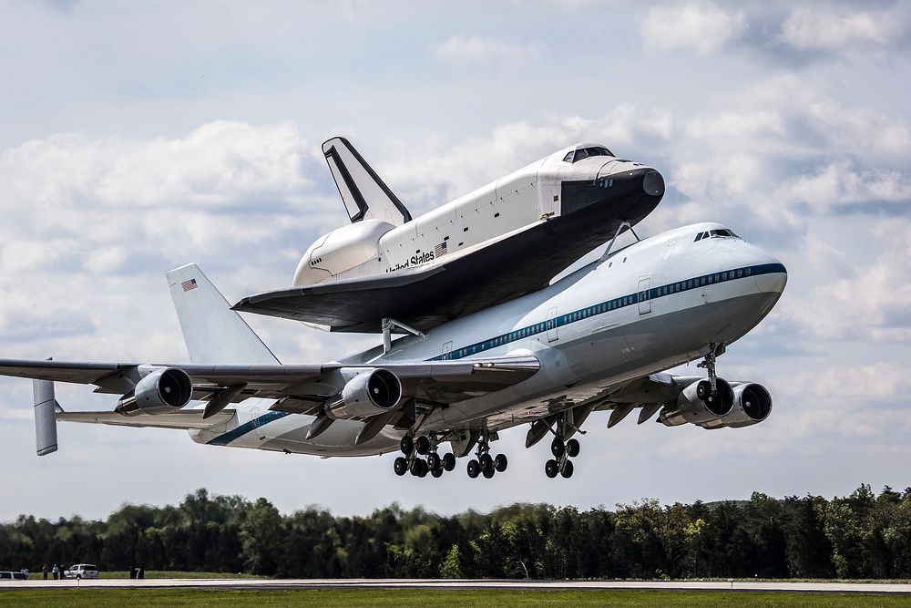 Space shuttle Enterprise, mounted atop a NASA 747 Shuttle Carrier Aircraft (SCA), is seen as it takes off for New York from…