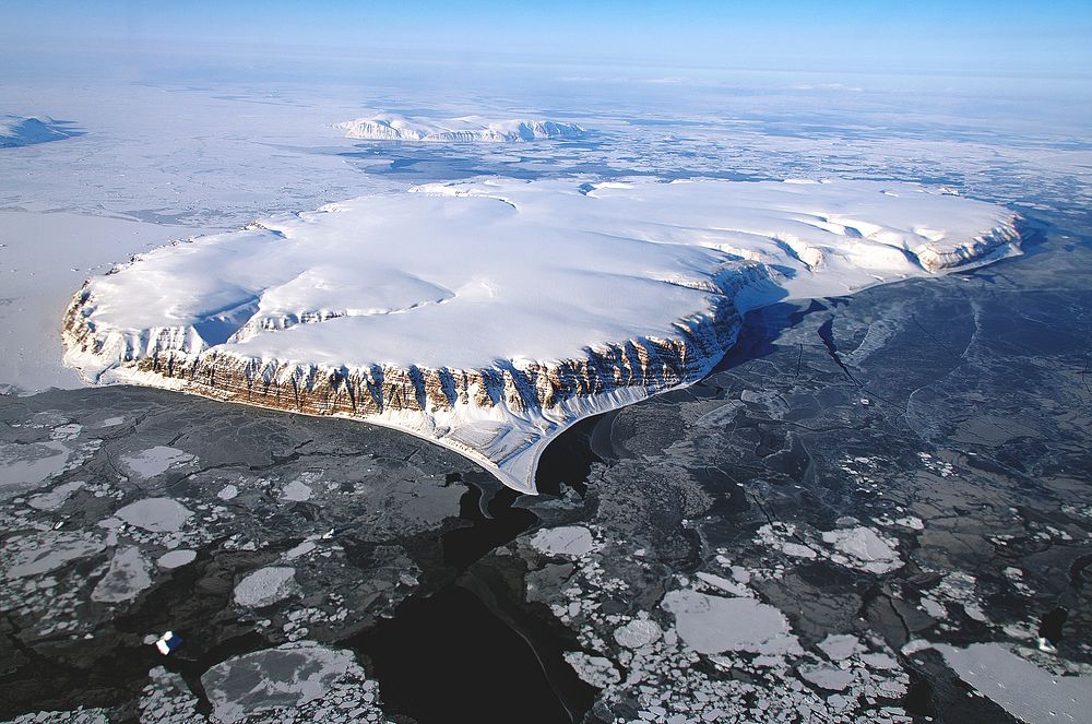 Saunders Island and Wolstenholme Fjord with Kap Atholl in the background. Original from NASA. Digitally enhanced by rawpixel.