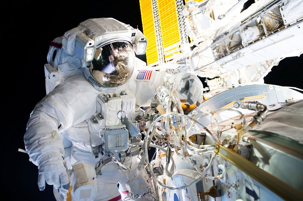 NASA astronauts successfully installed a new international docking adapter on Aug 19, 2016. Original from NASA . Digitally…