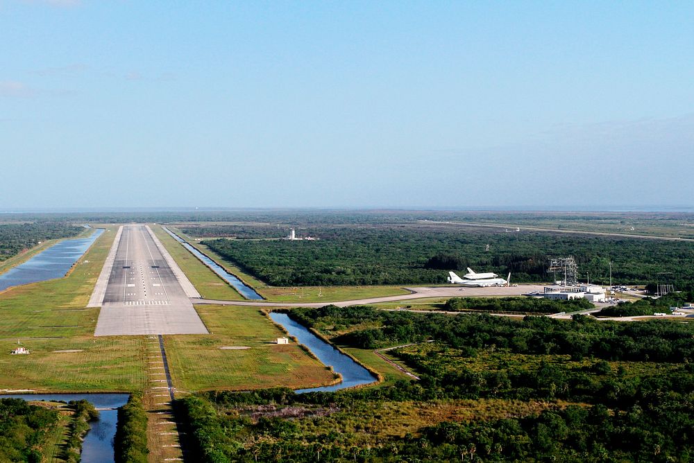 This is an aerial view of the long Shuttle Landing Facility SLF runway at NASA's Kennedy Space Center in Florida. Original…