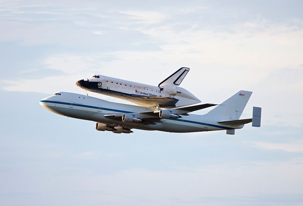 NASA's Shuttle Carrier Aircraft with the space shuttle Endeavour mounted atop, prepares to make a low-level pass over the…