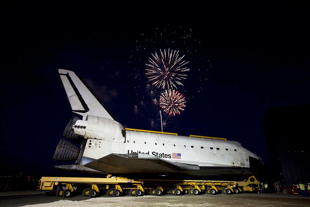 Fireworks celebrate the arrival of the space shuttle Atlantis at the Kennedy Space Center Visitor Complex following a 10…