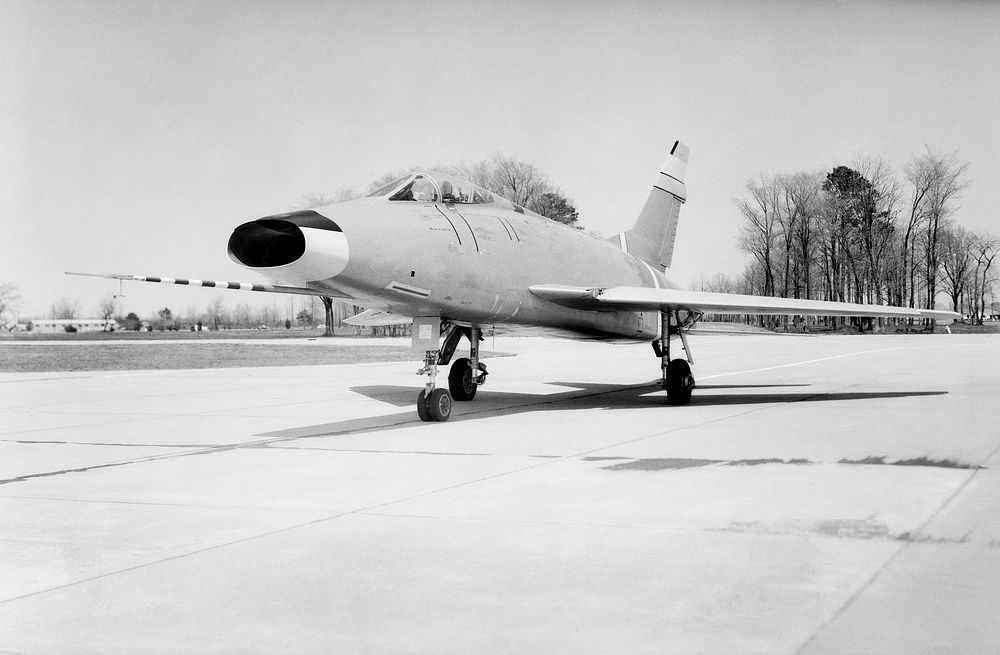 North American F-100 C airplane used in sonic boom investigation at Wallops, October 7th, 1958. Original from NASA.…