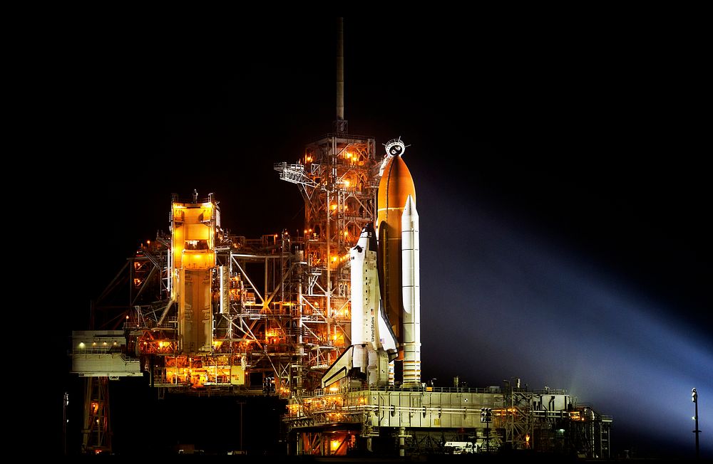 The space shuttle Discovery is seen shortly after the Rotating Service Structure was rolled back at launch pad 39A, at the…