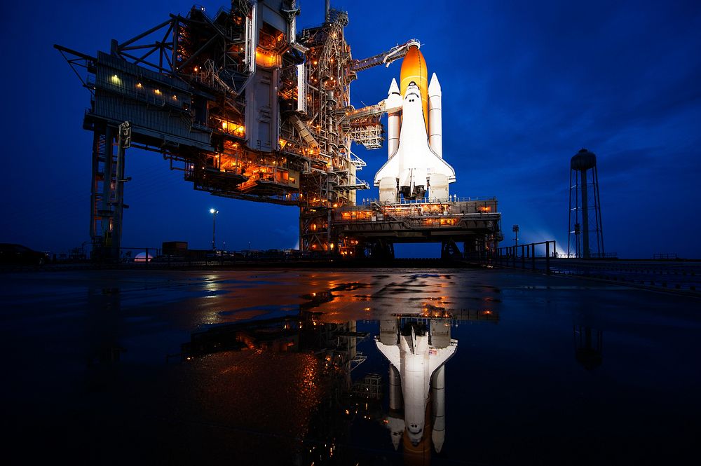 The space shuttle Atlantis is seen shortly after the rotating service structure (RSS) was rolled back at launch pad 39a…