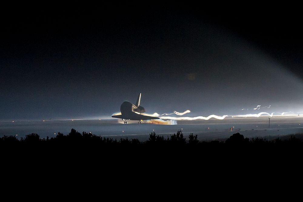 Space shuttle Atlantis touches down at NASA's Kennedy Space Center Shuttle Landing Facility completing its 13-day mission to…