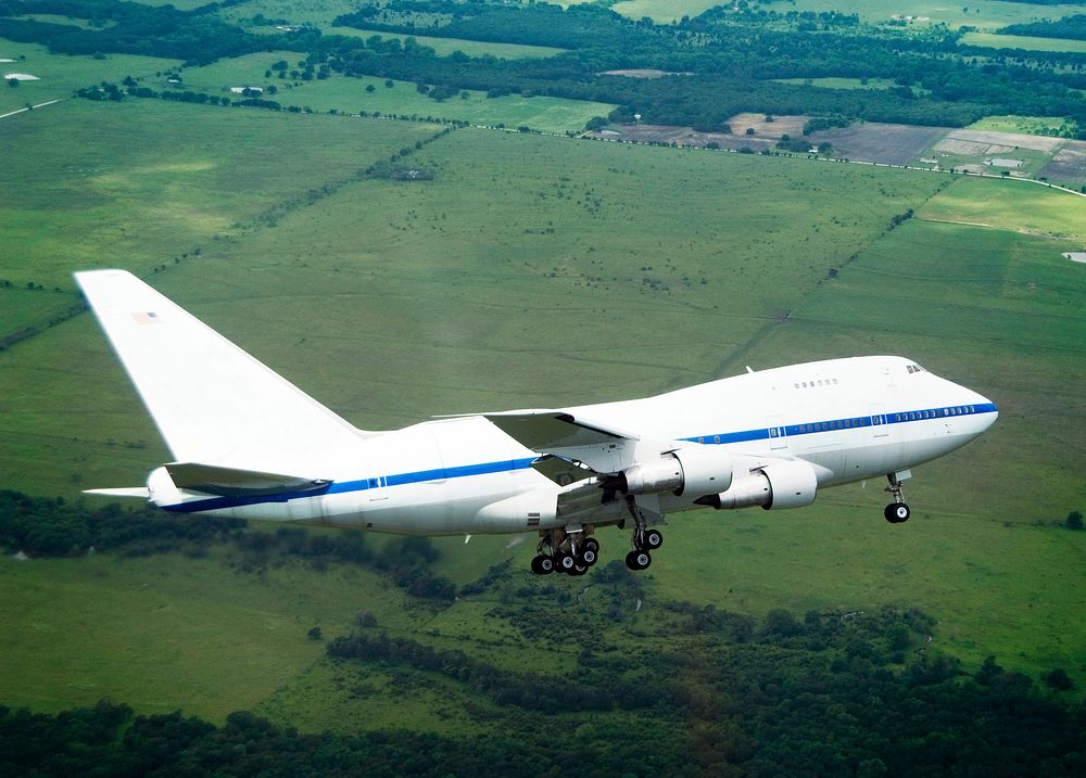 NASA's highly modified Boeing 747SP SOFIA observatory banks low over the Texas countryside as it heads for landing at Waco…