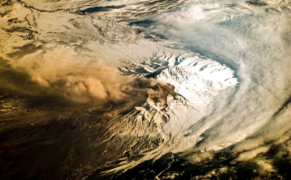 A plume at Shiveluch Volcano, Kamchatka Peninsula, Russia. Original from NASA. Digitally enhanced by rawpixel.