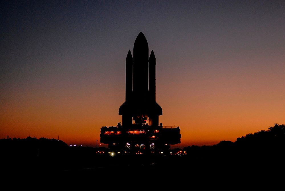 The Space Shuttle Atlantis, secured atop a mobile launch platform. Original from NASA. Digitally enhanced by rawpixel.