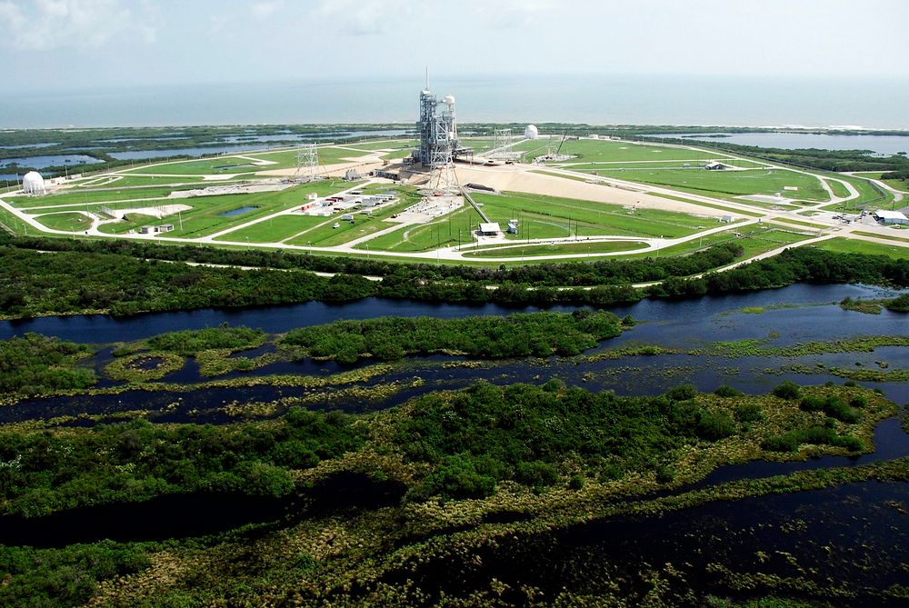 This aerial view shows the high water surrounding Launch Pad 39A at NASA's Kennedy Space Center following Tropical Storm…