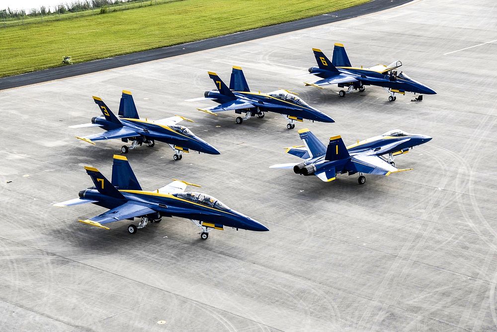 The U.S. Navy's F/A-18 Blue Angels begin taxiing toward the runway at the Shuttle Landing Facility at NASA's Kennedy Space…