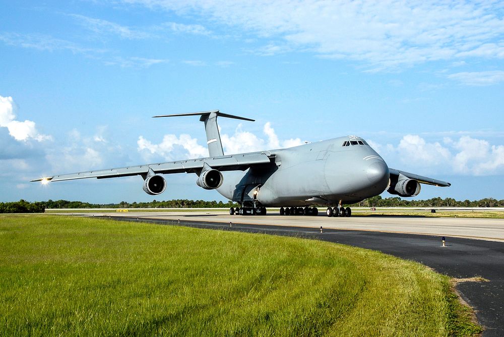 The U.S. Air Force C-17 aircraft arrives at NASA Kennedy Space Center's Shuttle Landing Facility with its SV-1 cargo of the…