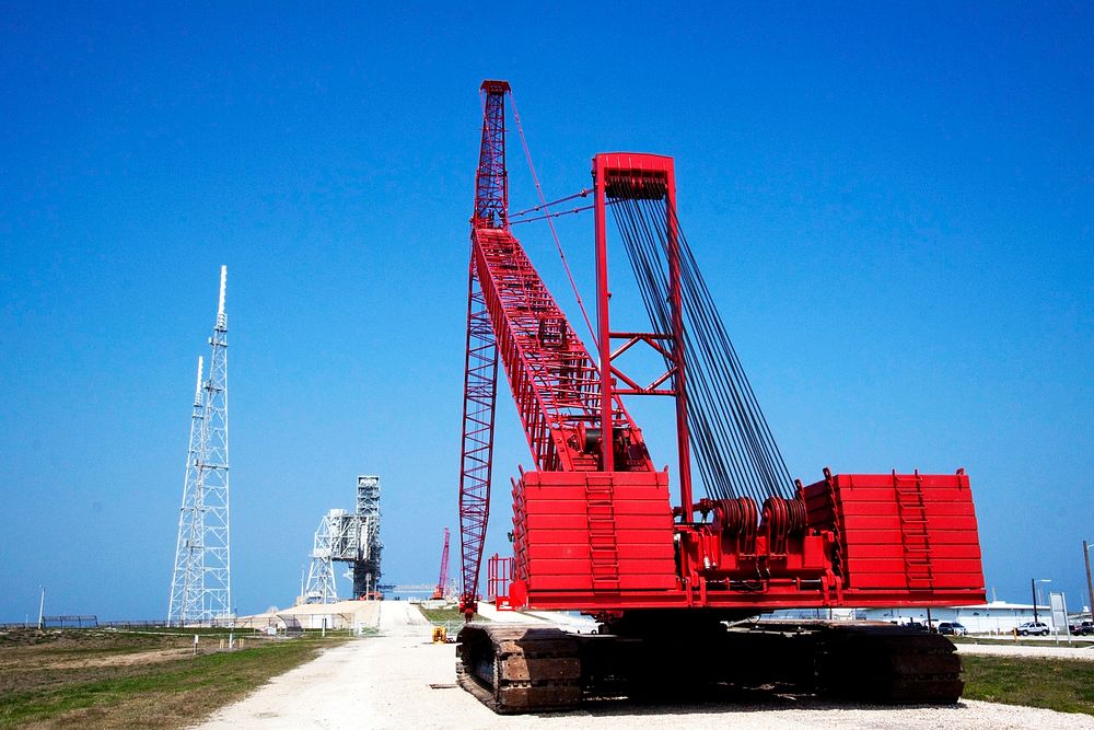 At NASA's Kennedy Space Center in Florida, a heavy-duty crane is slowly making its way to Launch Pad 39B. Original from…