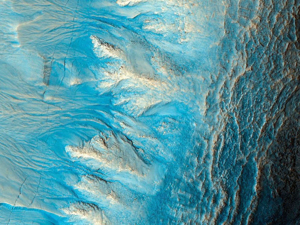 Side of an impact crater in the mid-latitudes of Mars' northern hemisphere. Original from NASA. Digitally enhanced by…
