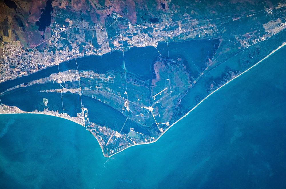 An almost nadir view of the John F. Kennedy Space Center was provided by one of STS-122 crewmembers with a digital camera.…