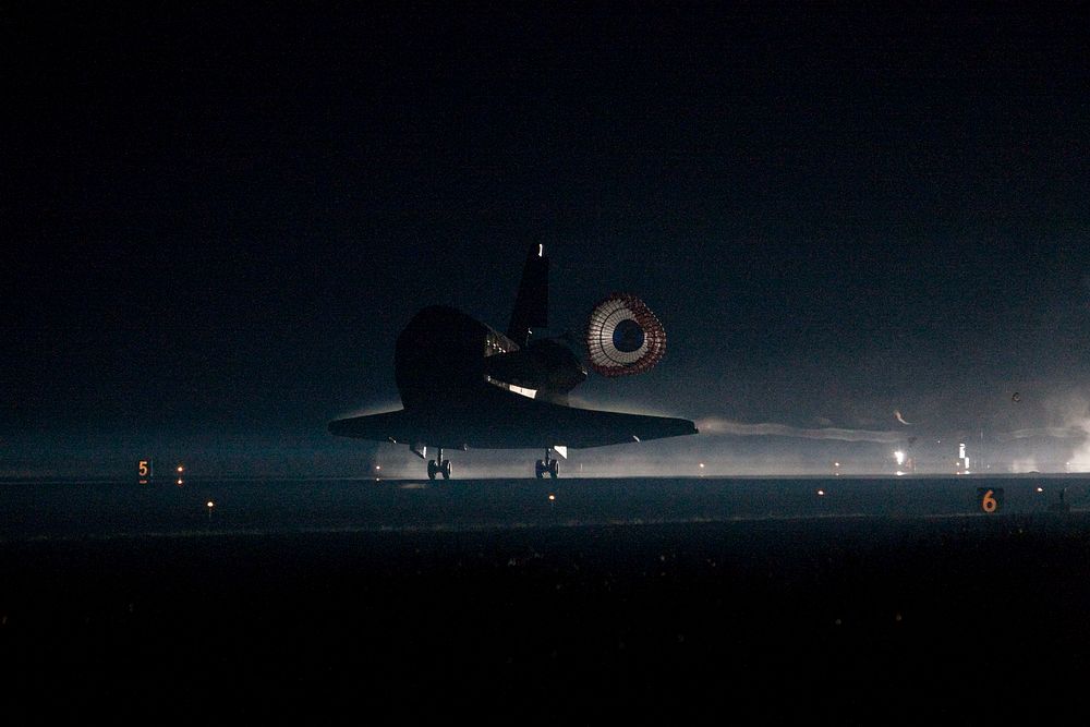 Atlantis nears touchdown for the final time on Runway 15 at the Shuttle Landing Facility at NASA's Kennedy Space Center in…
