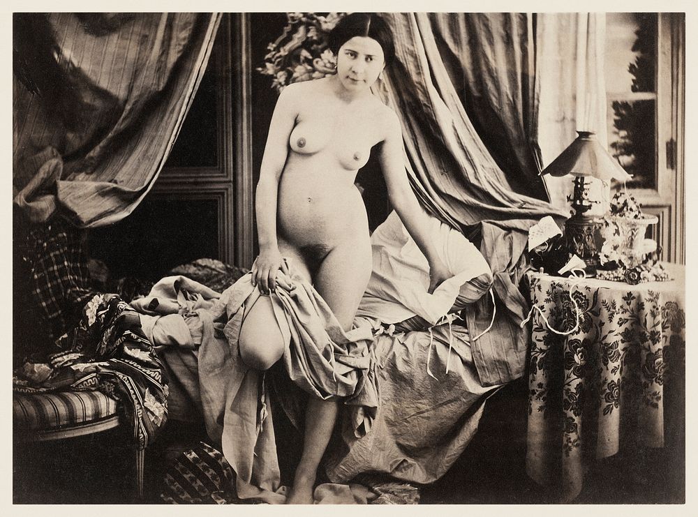 Nude photography of naked woman, Nude Standing by Bed (ca. 1854) by Auguste Belloc. Original from The MET Museum. Digitally…