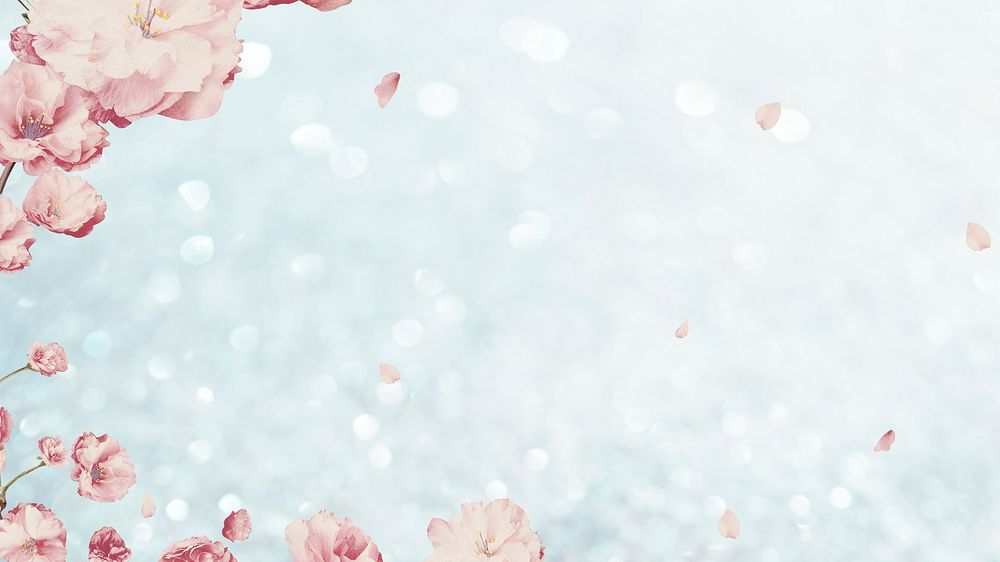 Pink cherry blossom flower branch bouquet border on blue glitter background