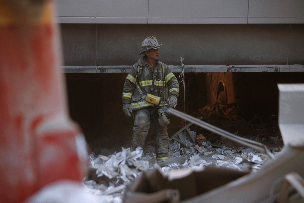 Rescue officer during the aftermath of the September 11 terrorist attack on the World Trade Center, New York City. Courtesy…