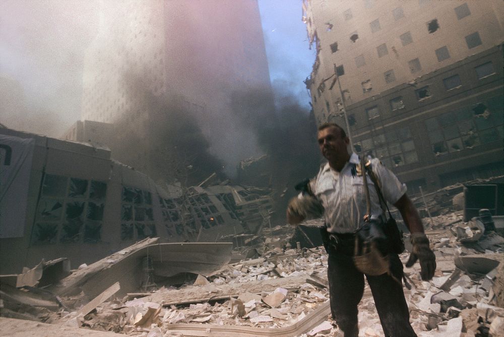 Rescue officer during the aftermath of the September 11 terrorist attack on the World Trade Center, New York City. Courtesy…