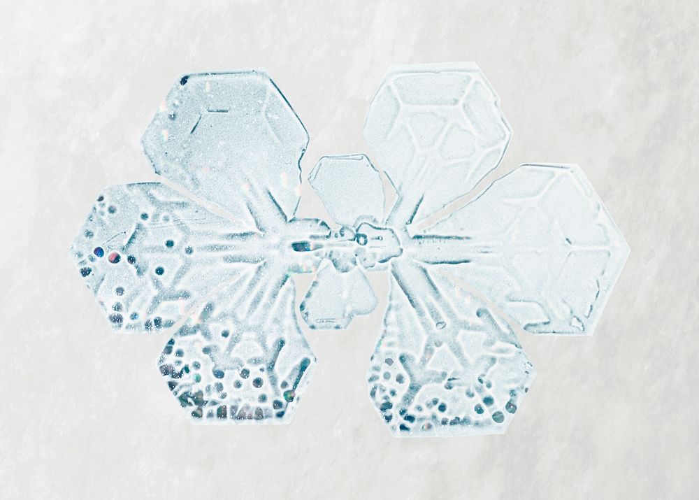 Snowflake Christmas ornament macro photography, remix of photography by Wilson Bentley