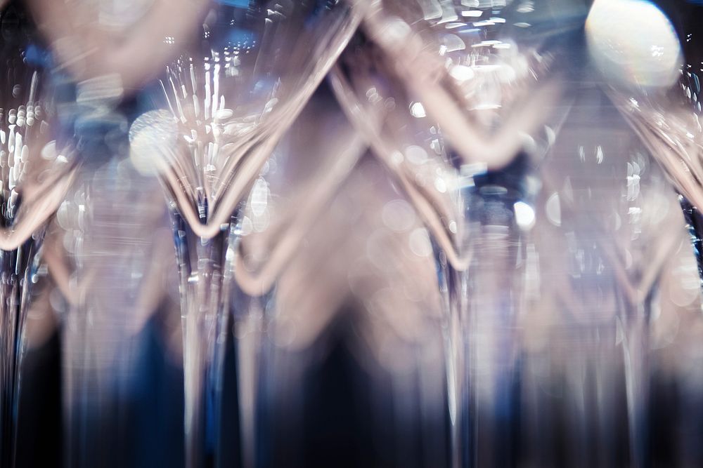 Close up of wine glasses lined up for an event