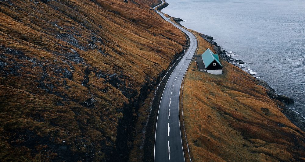 Scenic freeway by the lake in Faroe Islands