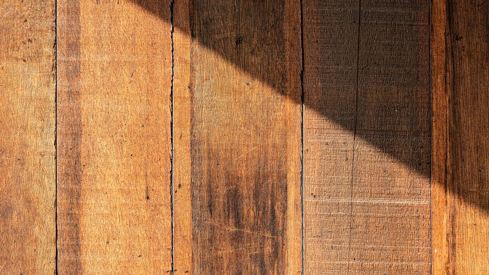 Natural light on brown wooden textured background