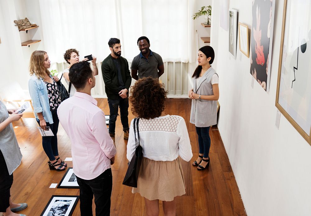 People attending an art exhibition