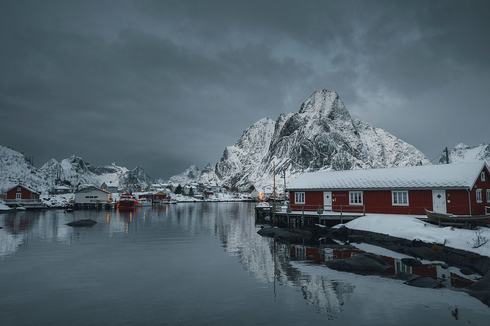 Red cabins on a snowy Reine in Moskenes&oslash;ya island, Norway