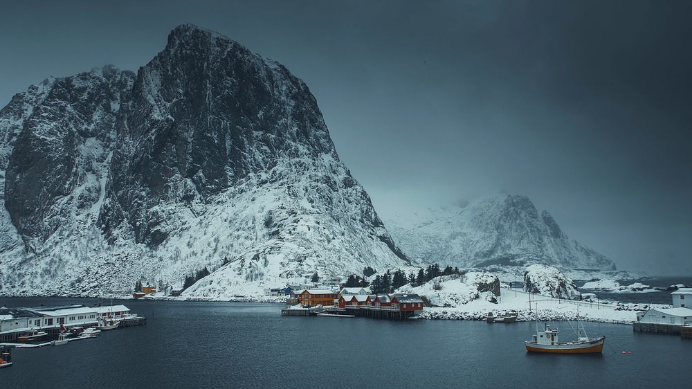 Winter desktop wallpaper background, snowy fishing village at Moskenes&oslash;ya island, Norway