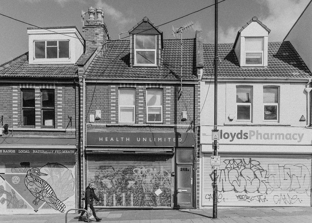 Woman walking in a city during coronavirus pandemic. BRISTOL, UK, March 30, 2020