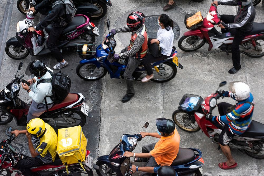 Motorcycles in Bangkok traffic aerial view. BANGKOK, THAILAND, 16 APRIL 2021