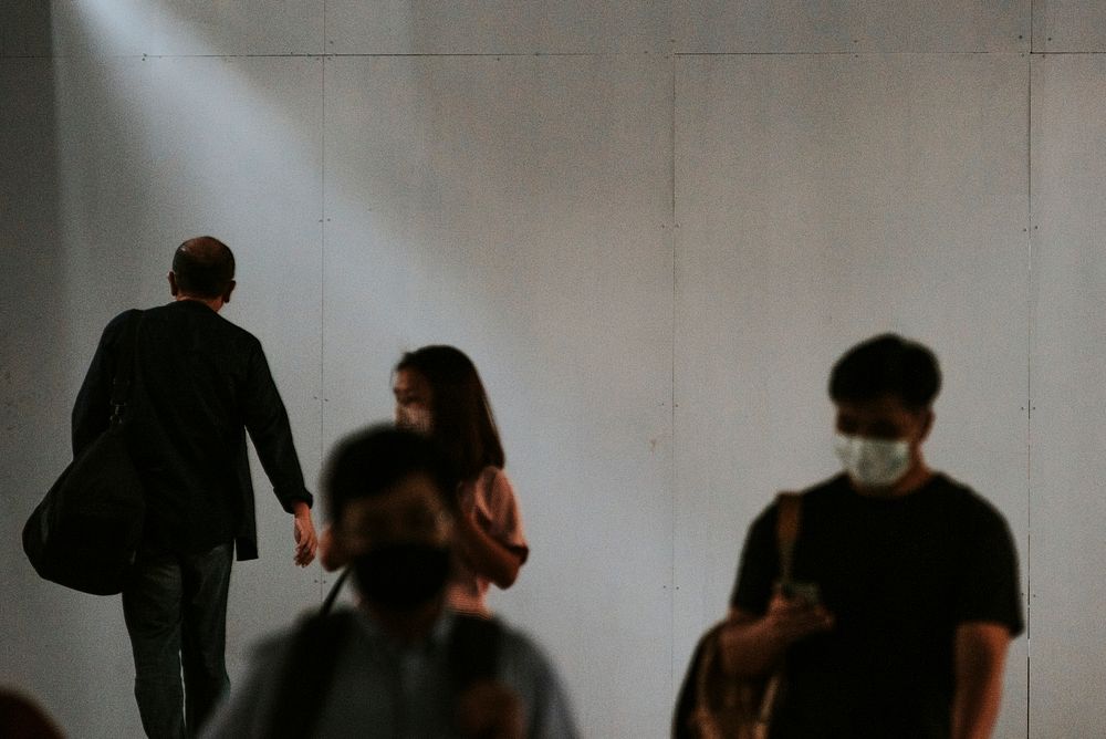 Crowd of people wearing mask walking in the new normal. BANGKOK, THAILAND, 16 APRIL 2021