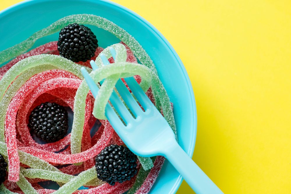Closeup of colorful jelly worms shown as spaghetti
