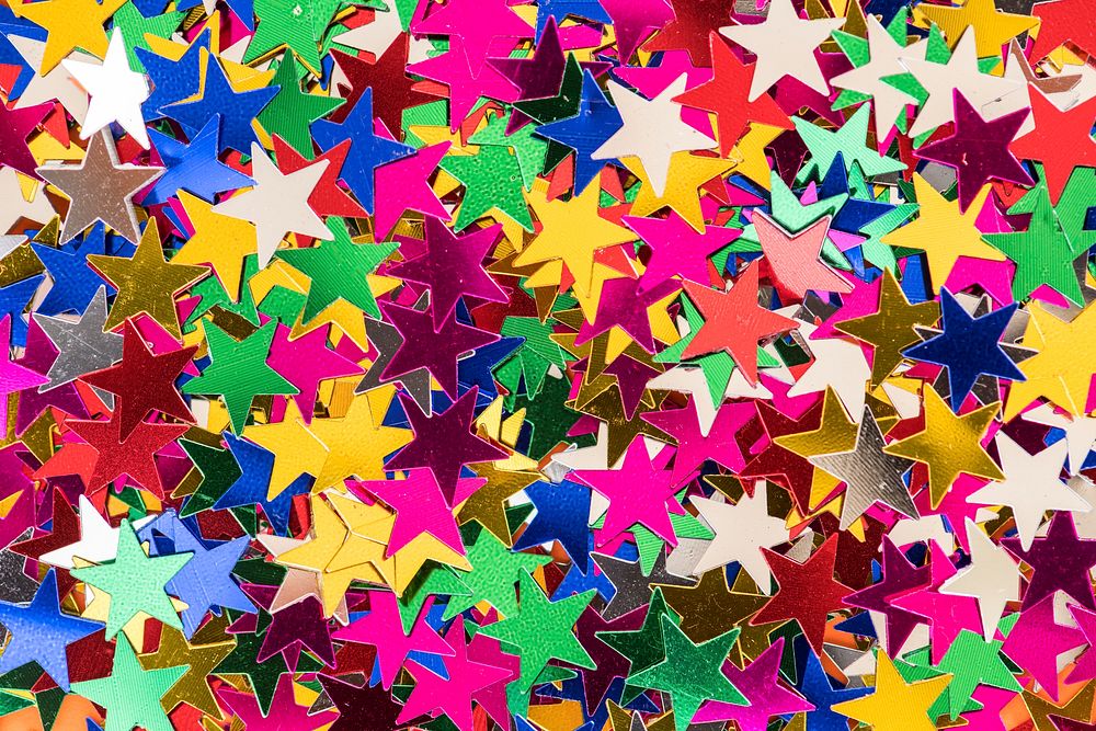 Colorful star sequin glitter textured background abstract