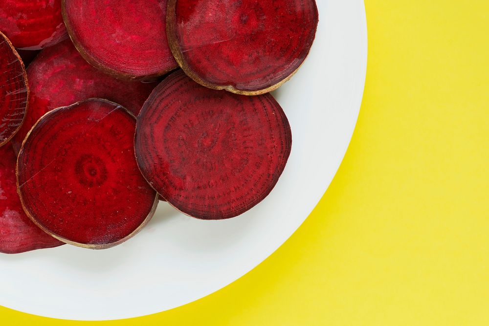 Round textured slices of beetroot on a plate