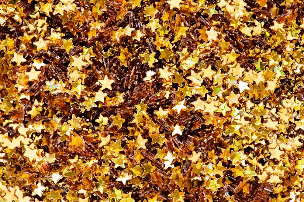 Closeup of golden stars decorative papers closeup