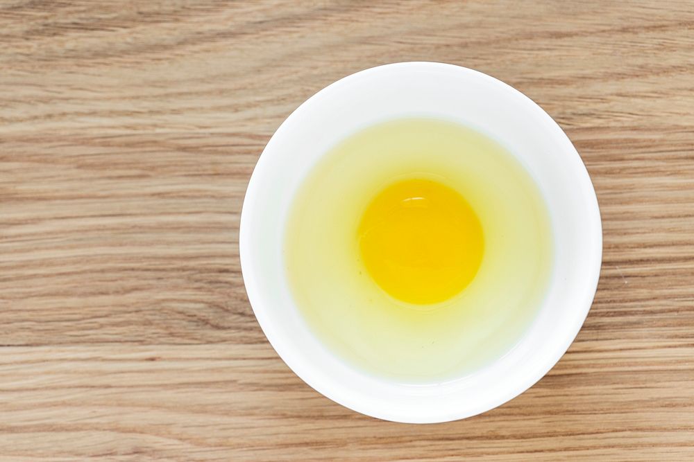 Raw egg in a bowl