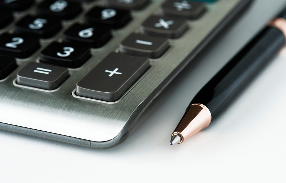 CLoseup of calculator with pen